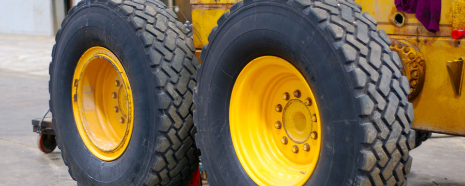 Image of VEMA managed Heavy Equipment showing large black and yellow wheels